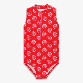 Half-zip swimsuit in cutout suns